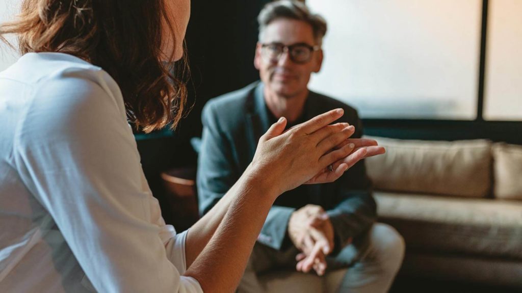 In person in a therapy session with a psychologist