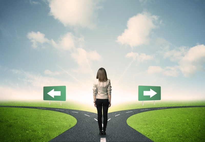 Person looking at signs not knowing which way representing ADHD working memory